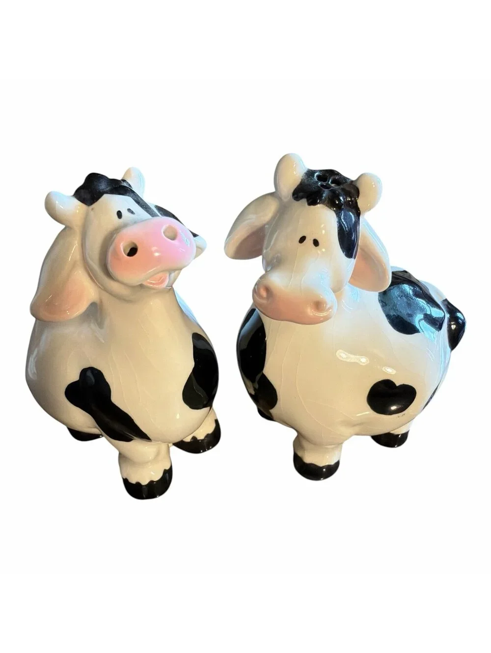 Salt and pepper cow shakers